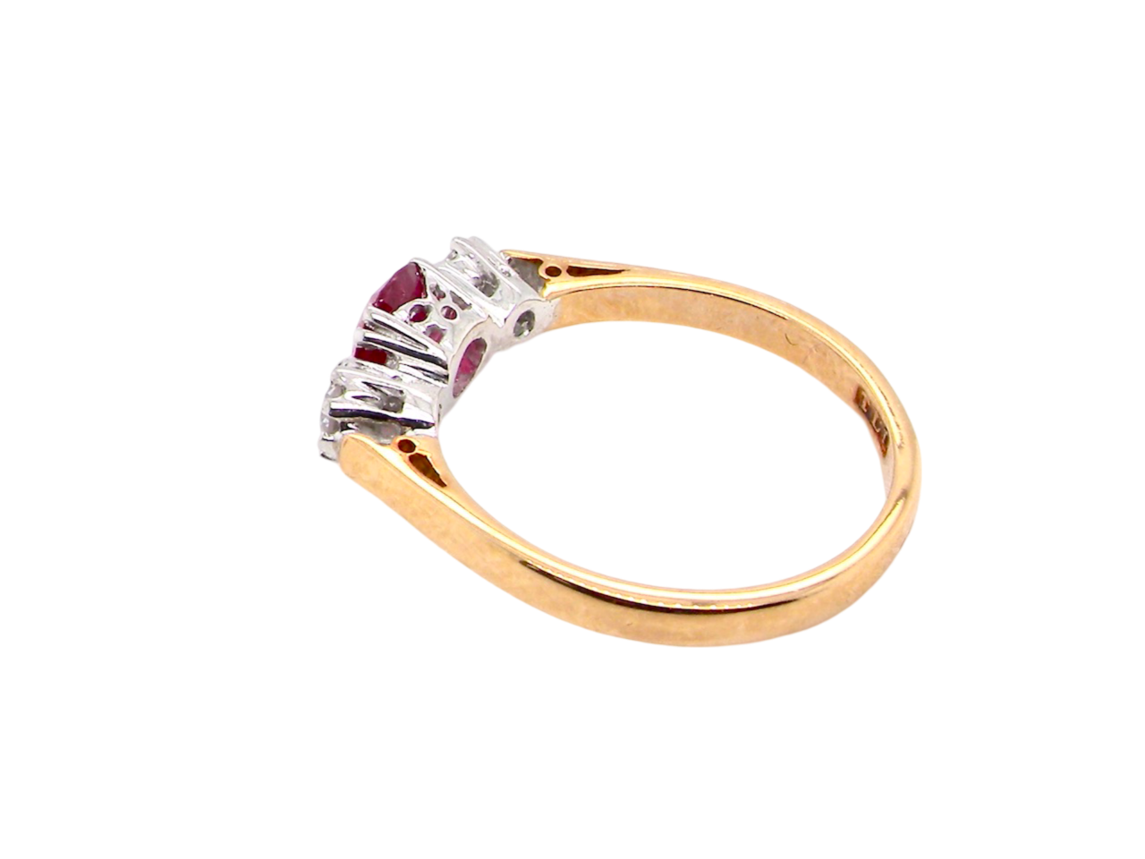 A Three Stone Ruby and Diamond Ring side view