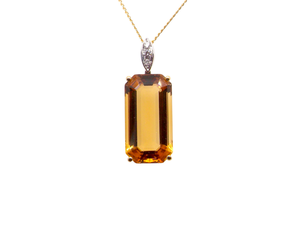 A Citrine and Diamond Pendant