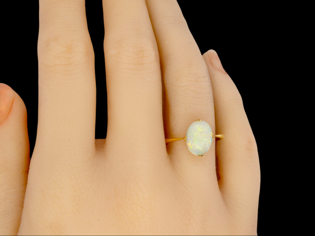 A single stone Opal Ring finger view