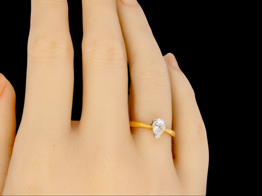 A fabulous Pear shaped Diamond Ring finger view