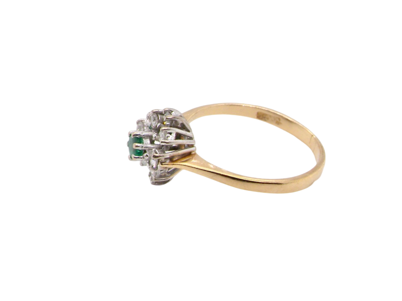 An Emerald and Diamond Cluster Ring side view