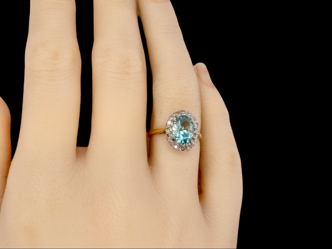 A vintage Blue Zircon and Diamond Ring finger view