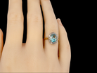 A vintage Blue Zircon and Diamond Ring finger view