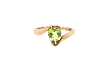 A pear shaped Peridot dress ring