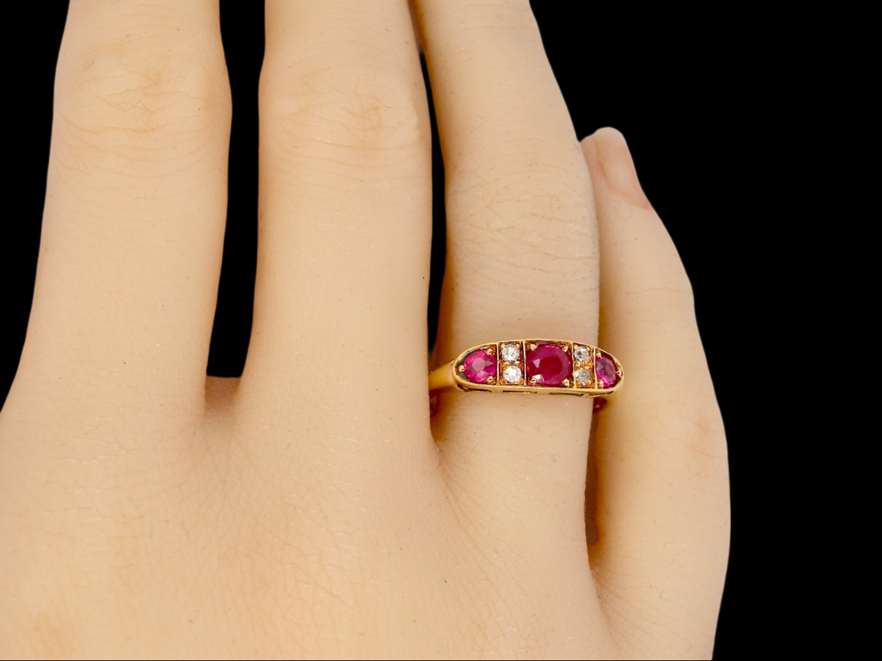 An early 20th century Ruby and Diamond Ring finger view