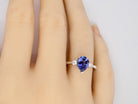 A Tanzanite and Diamond Ring finger view