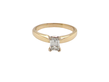 An Emerald Cut Solitaire Diamond Ring