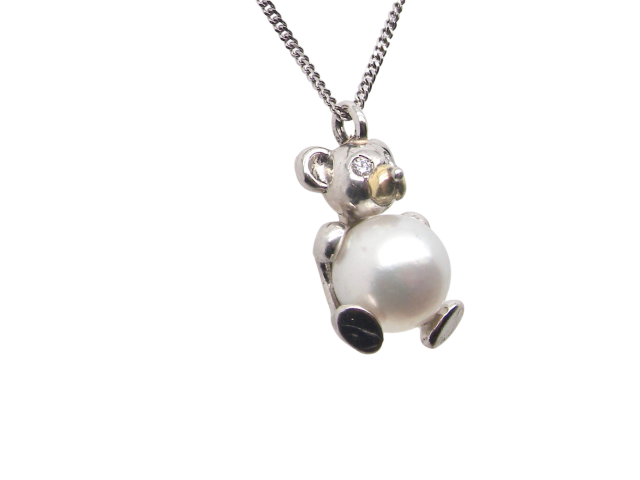 A Teddy Bear Pendant with diamonds