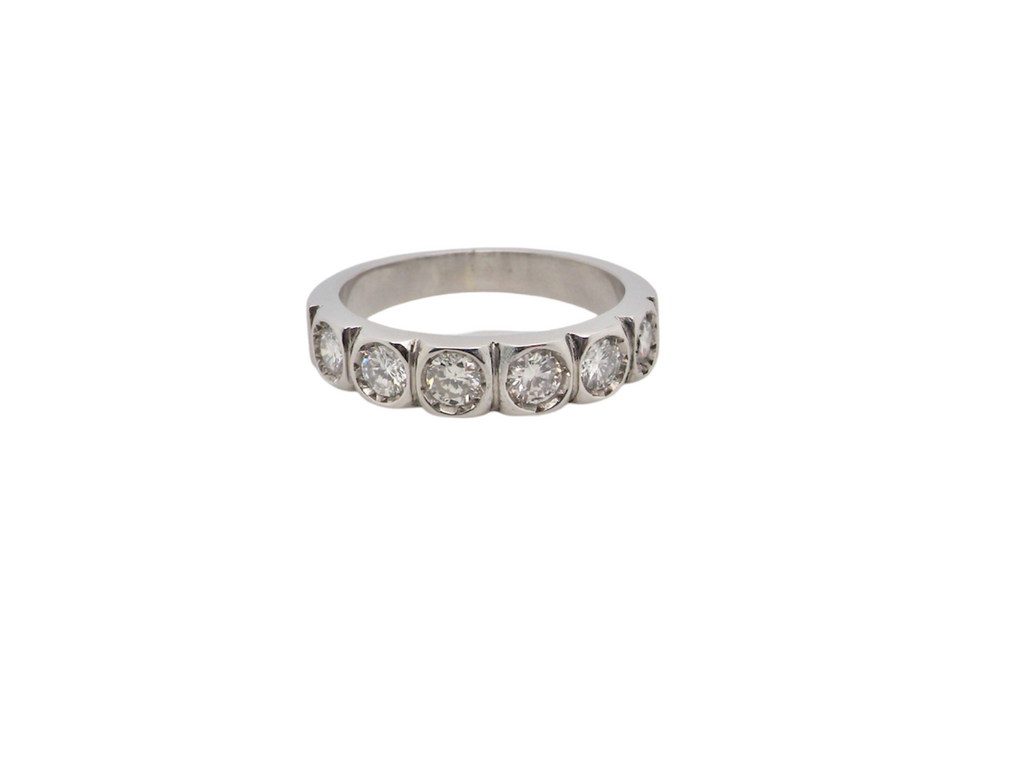 A Diamond half hoop ring