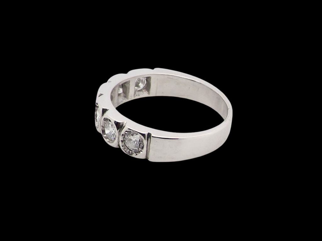 A Diamond half hoop ring from one side