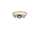 An Emerald and Diamond three stone ring