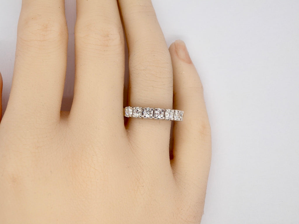 A white gold Diamond Eternity Ring finger view