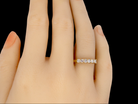 A half hoop diamond ring finger view