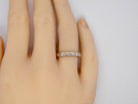 A white gold Diamond Eternity Ring finger view