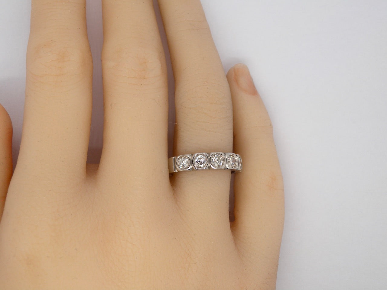 A Diamond half hoop ring finger view