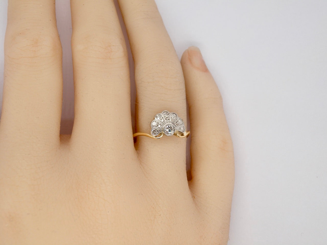 An Art Deco fan shaped Diamond Ring finger view