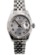 A womans steel Rolex wrist watch 179174