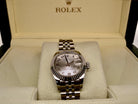 A womans steel Rolex wrist watch 179174 in box