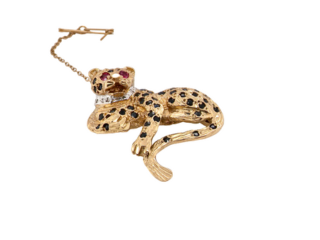 A  9 carat gold gemset leopard brooch
