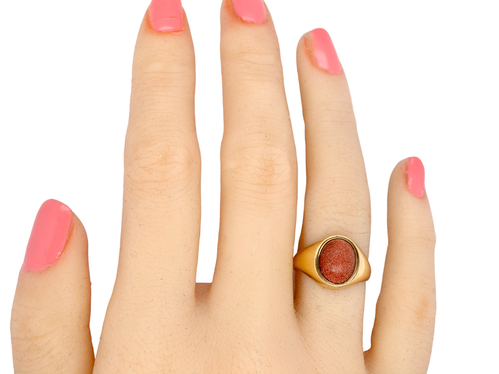 woman's goldstone signet ring
