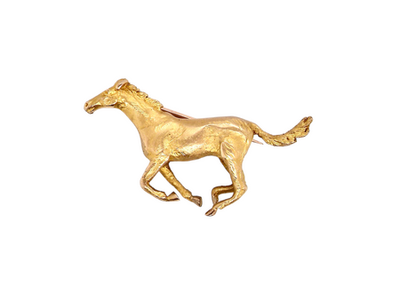 gold horse shaped brooch
