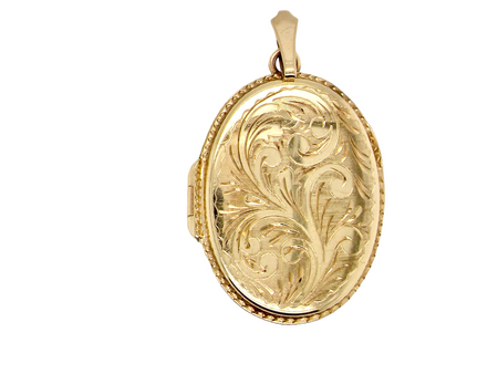 A large 9 carat gold locket