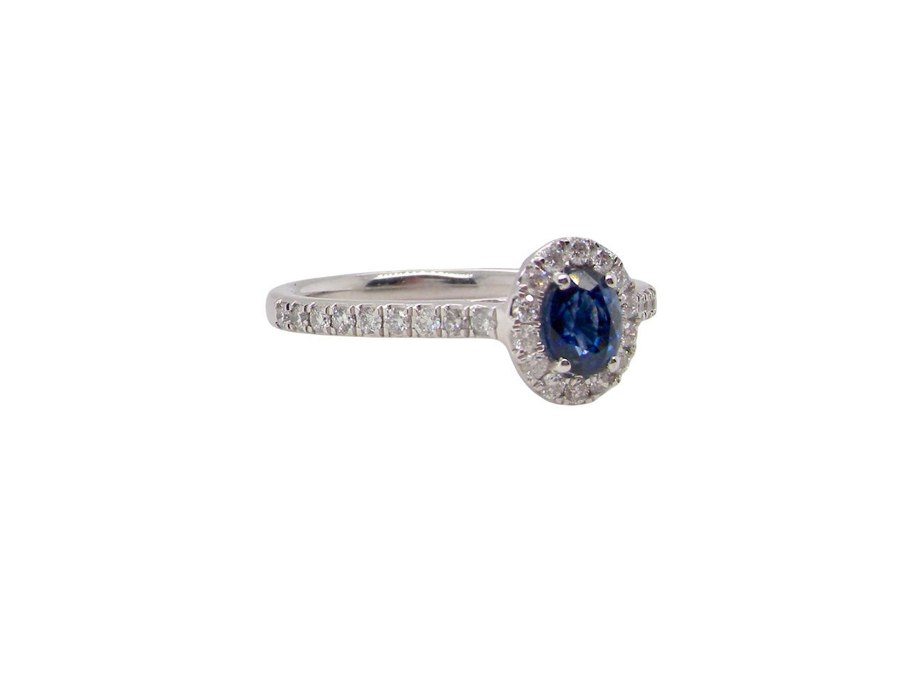 A Pretty Platinum Sapphire and Diamond Cluster Ring