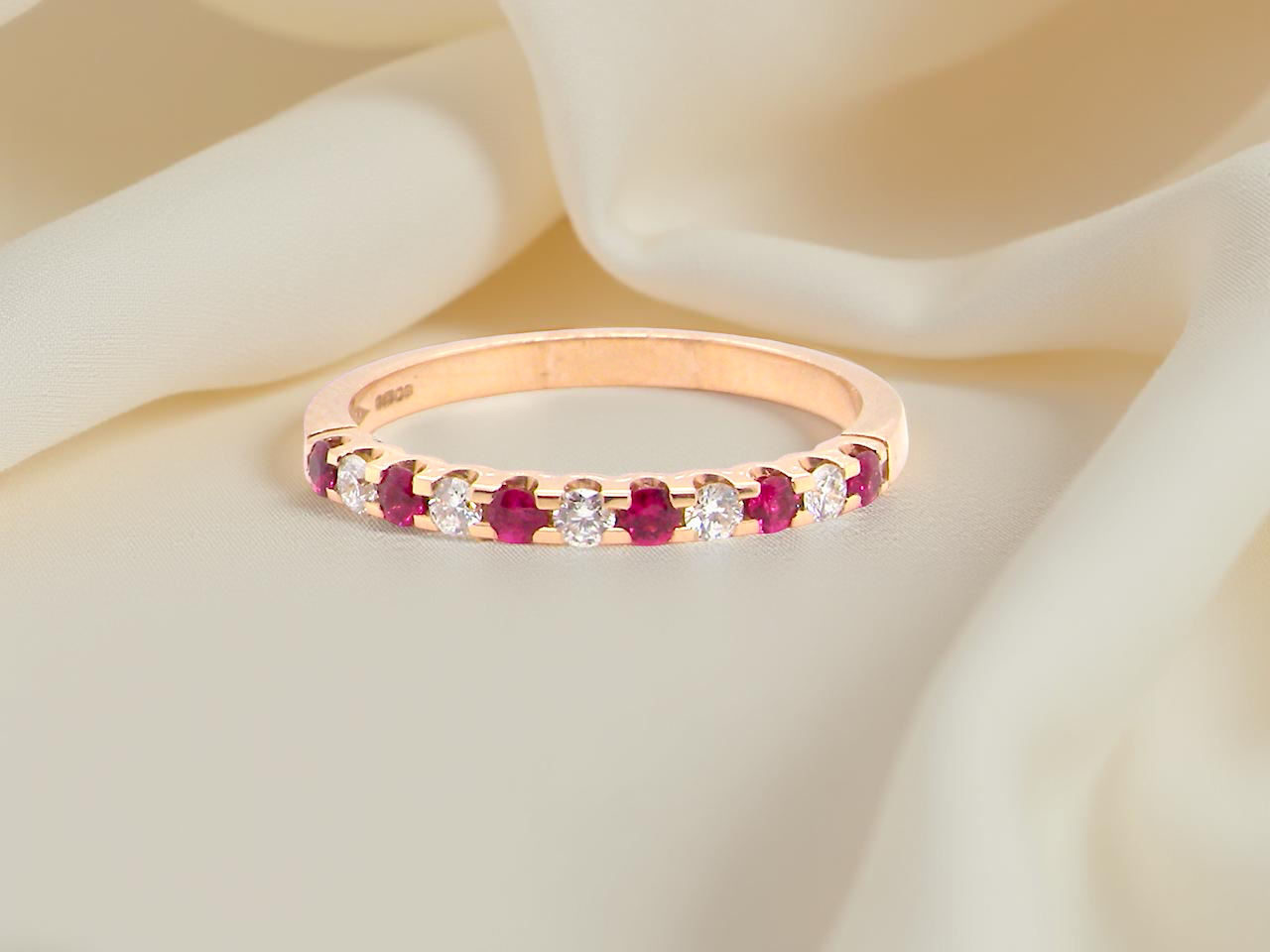 An 18 carat Ruby and Diamond eternity ring