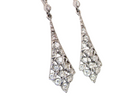 Designed in the elegant style of the 1920s, drop earrings are crafted in 18ct white gold.
