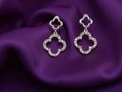 Each earring is set with brilliant cut white diamonds, to a total of 0.51 carats.&nbsp; new