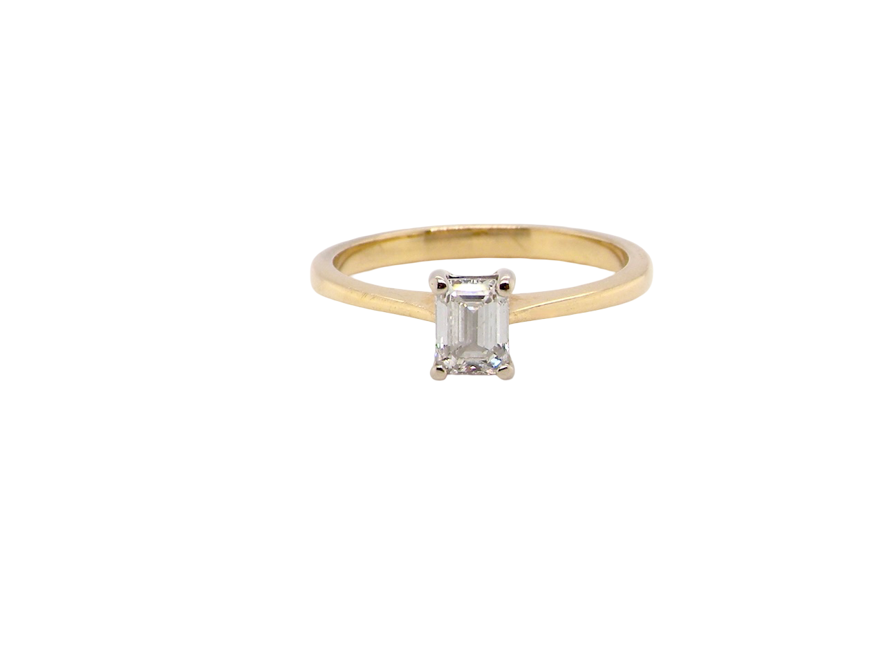 Elegant and timeless, this solitaire ring features a beautifully cut emerald-cut diamond measuring 5 x 4mm, confirmed at approximately 0.40 carats. The diamond is graded J colour and VS clarity, offering excellent sparkle and impressive clarity for everyday wear or a meaningful occasion piece.