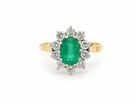Features an oval cut emerald centre stone, vibrant green hues, measures 9x6mm(est 1.75 carats) . Complimented by an outer halo of ten 2.7mm brilliant cut white diamonds (est total 0.60 carats) 
