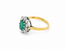 Features an oval cut emerald centre stone, vibrant green hues, measures 9x6mm(est 1.75 carats) . Complimented by an outer halo of ten 2.7mm brilliant cut white diamonds (est total 0.60 carats) colour i-j, clarity S.
side