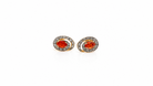 Pair of earrings with fire opals on a white background