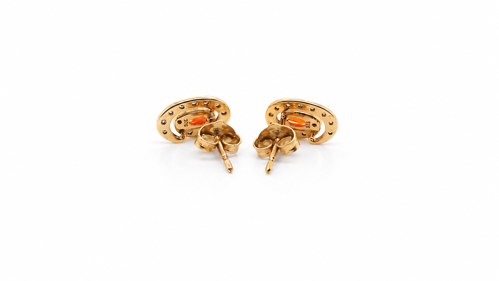 Pair of earrings with fire opals on a white background reverse view