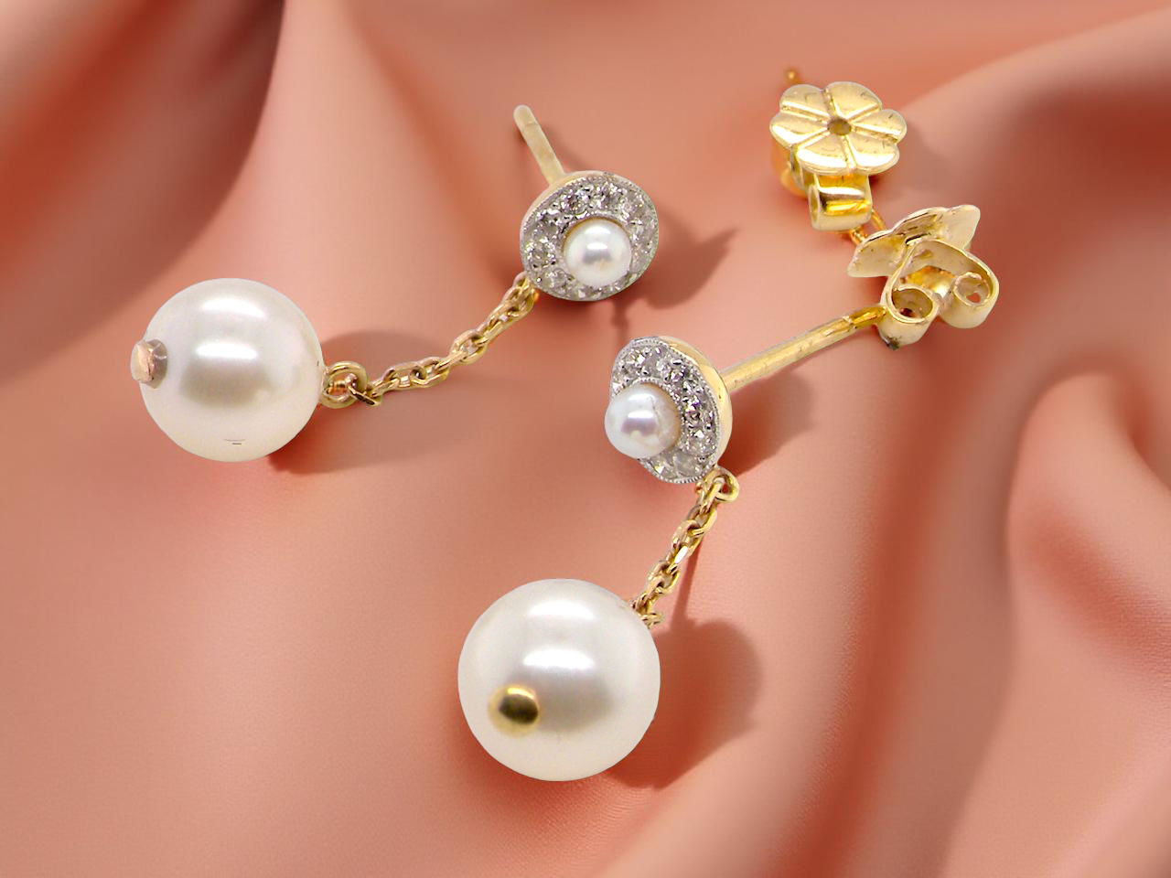 pair pearl and diamond drop earrings