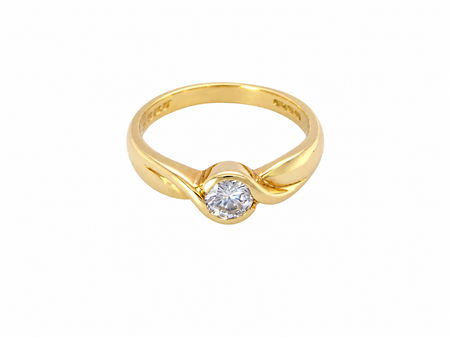 A yellow gold solitaire ring with a round-cut clear gemstone, set in a twisted band design, shown on a plain white background.
