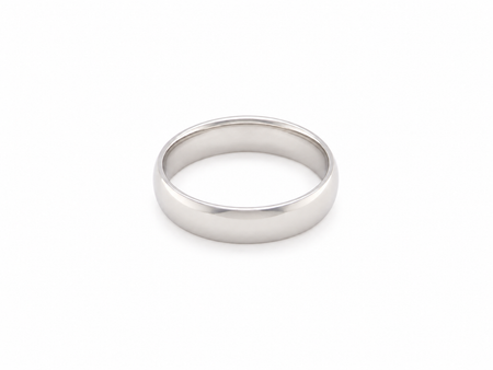 A classic flat band wedding ring in polished  white gold metal, shown on a clean white background.