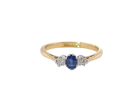 A classic sapphire and diamond three stone ring