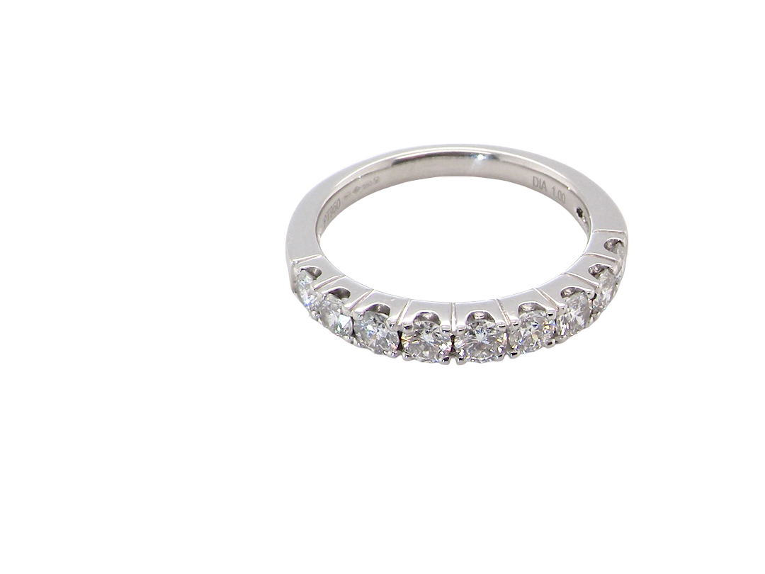 above A fine seven stone half hoop platinum eternity ring, total measures 0.70 carats
