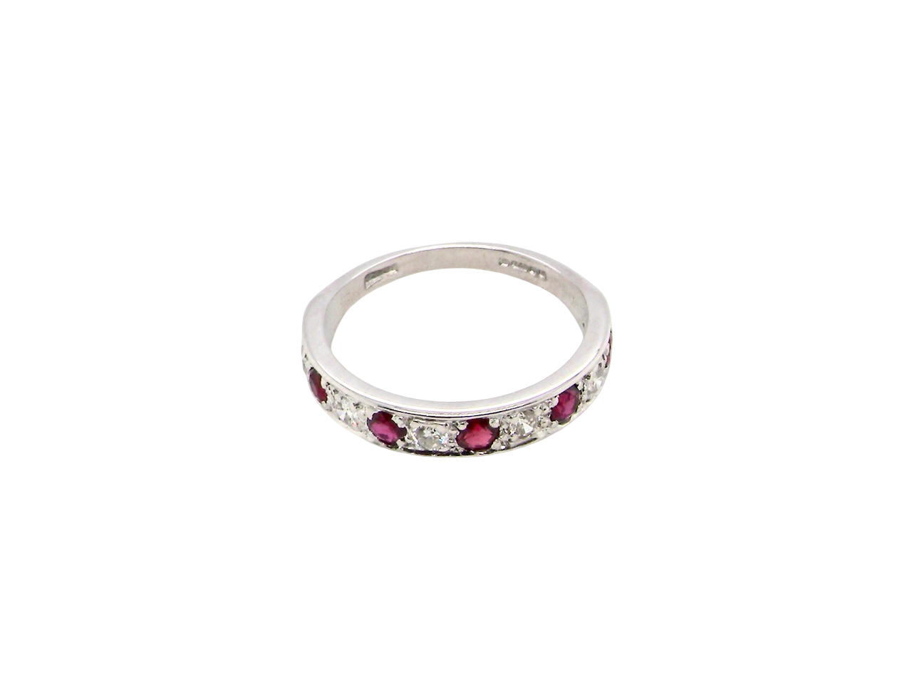 above view An 18 carat white gold half hoop eternity ring. Set with five round 3mm rubies (est 0.50 carats)&nbsp;

