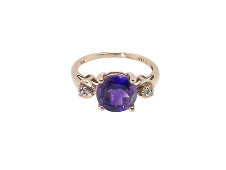 An amethyst and diamond dress ring