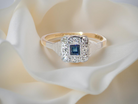 antique cluster ring. small square sapphire