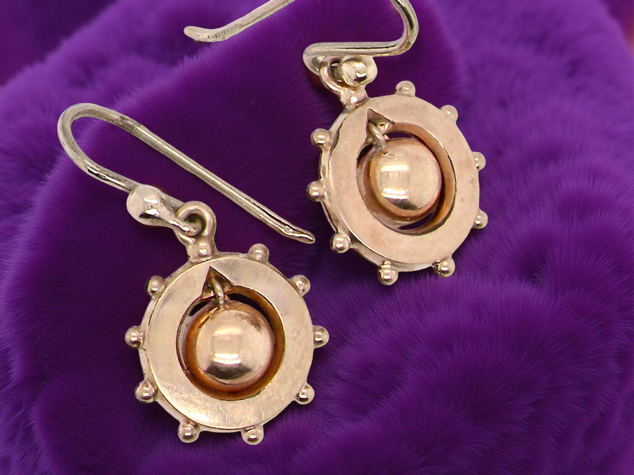 An antique pair of gold drop earrings