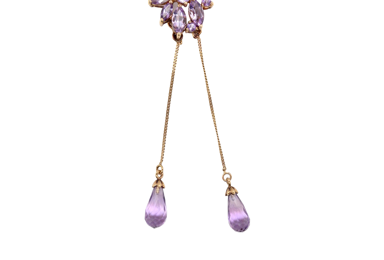 Purple teardrop earrings with gold accents on a white background