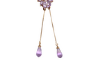 Purple teardrop earrings with gold accents on a white background