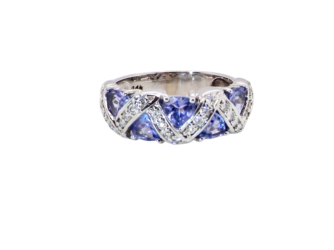 beautiful and eye-catching dress ring set in 14ct white gold, featuring five triangular tanzanite gemstones