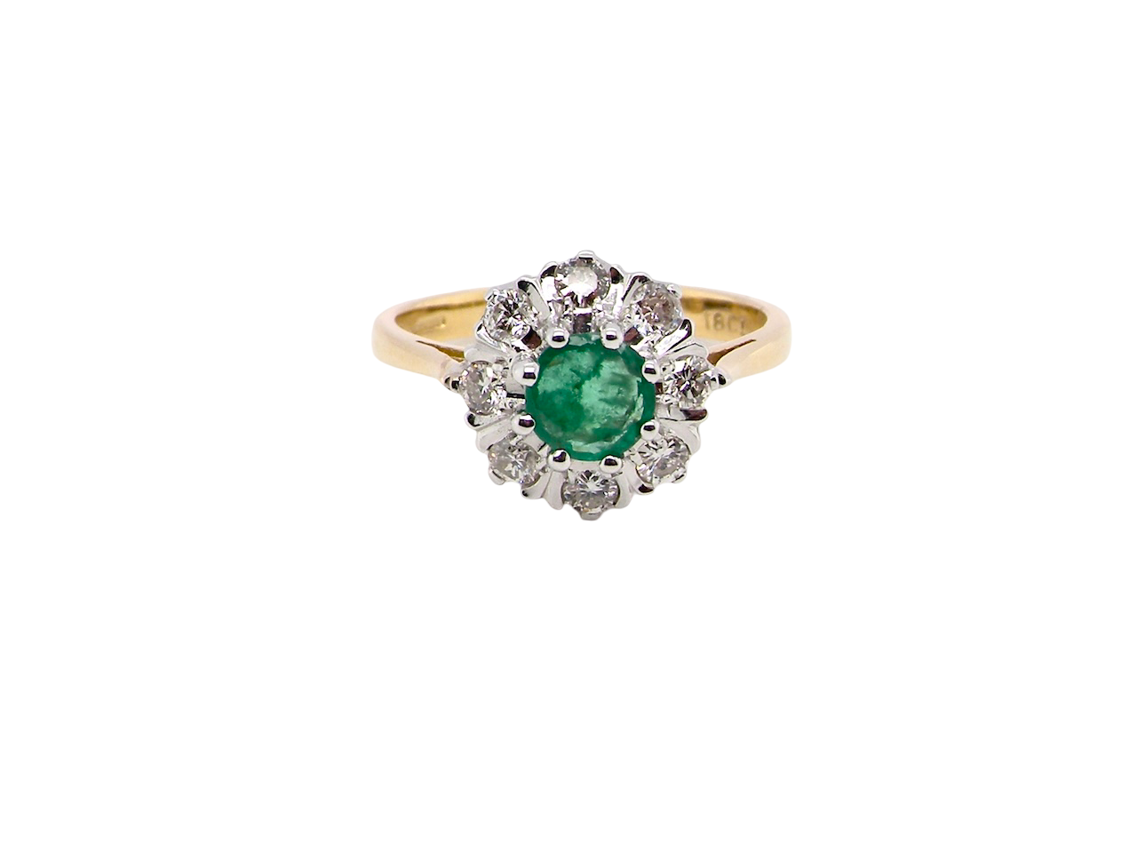  beautiful cluster ring featuring a&nbsp;6mm round emerald 
