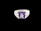  beautiful dress ring crafted in 14ct white gold (stamped 585), featuring a stunning rectangular-cut Tanzanite measuring approximately 9 x 7.5mm, 