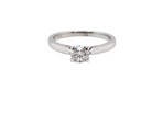  beautifully crafted solitaire ring featuring a brilliant-cut white diamond 